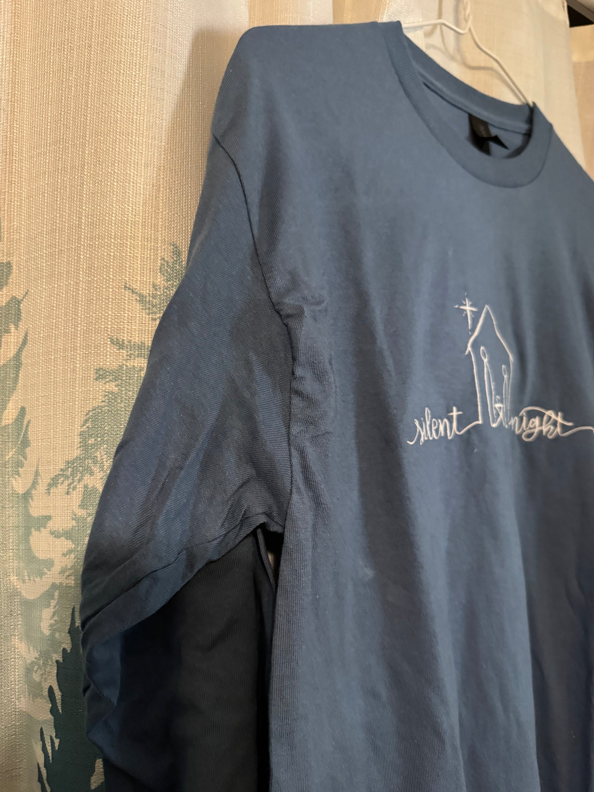 Medium Gildan long sleeve tee Silent night (manufacturer flaw shown in second photo, bunching in the sleeve)