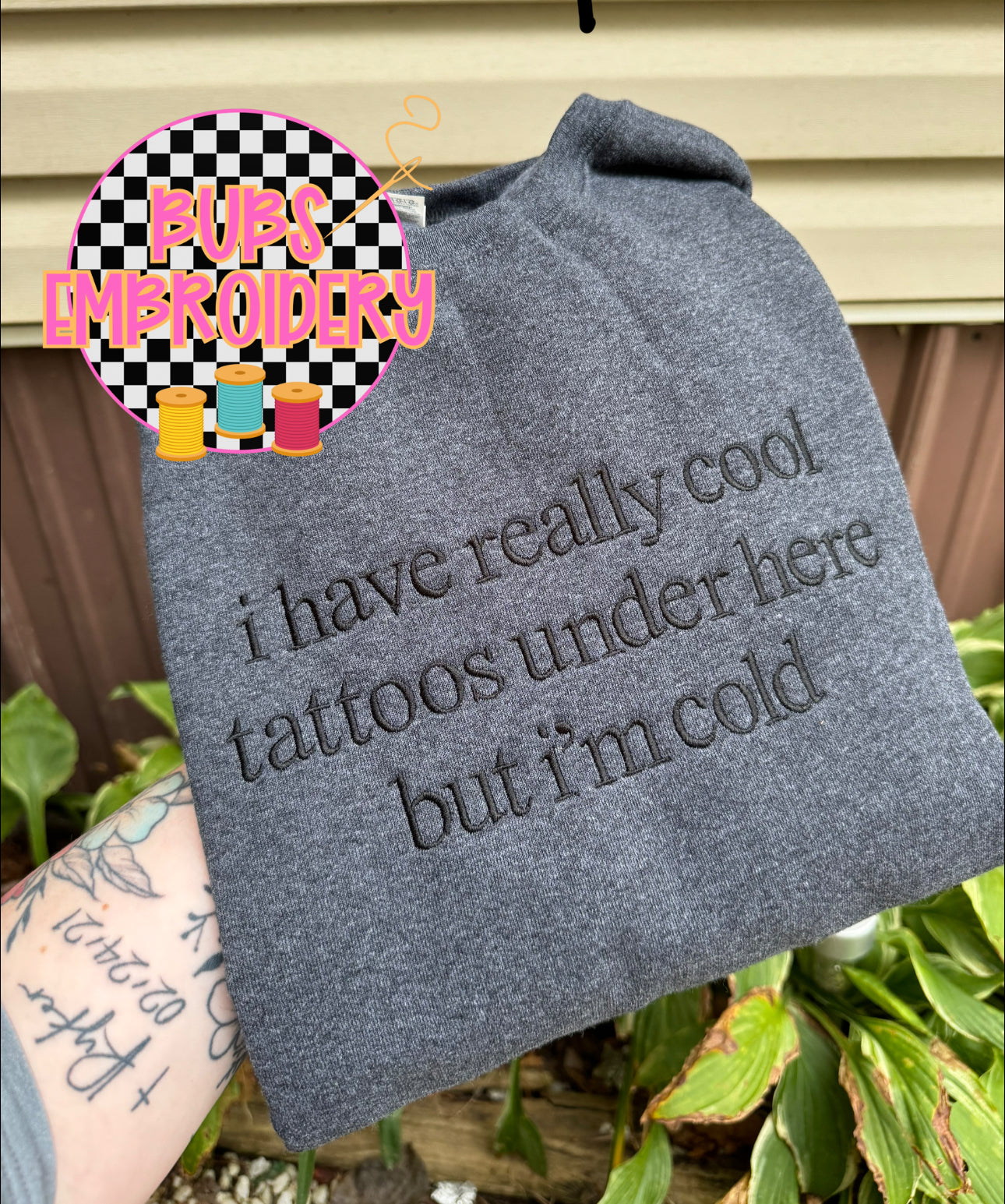 I have really cool tattoos under here but I’m cold sweatshirt