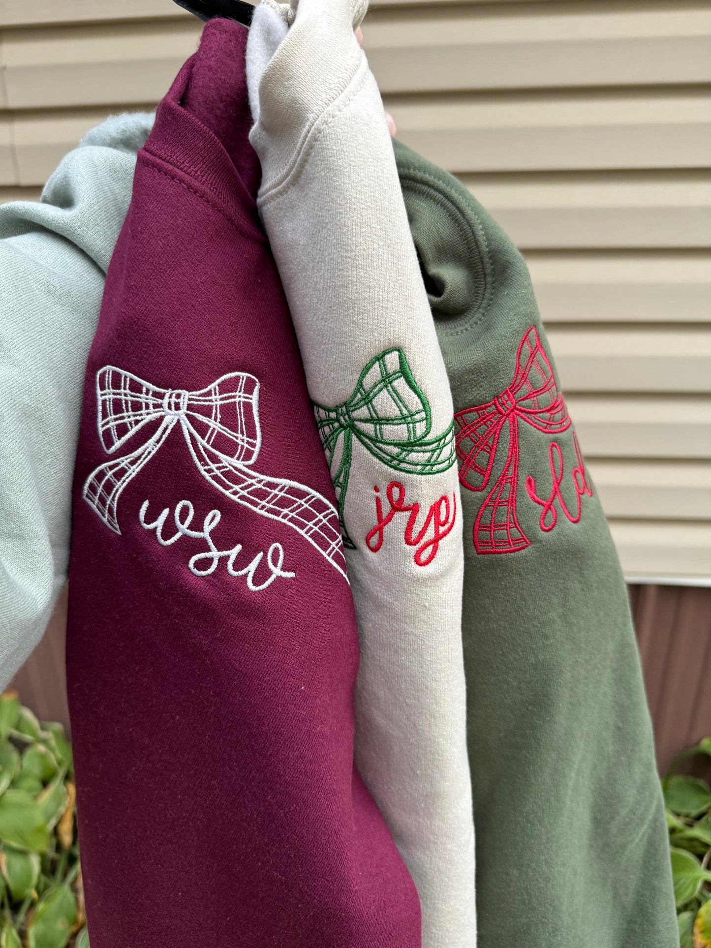Oversized pocket bow monogram sweatshirt