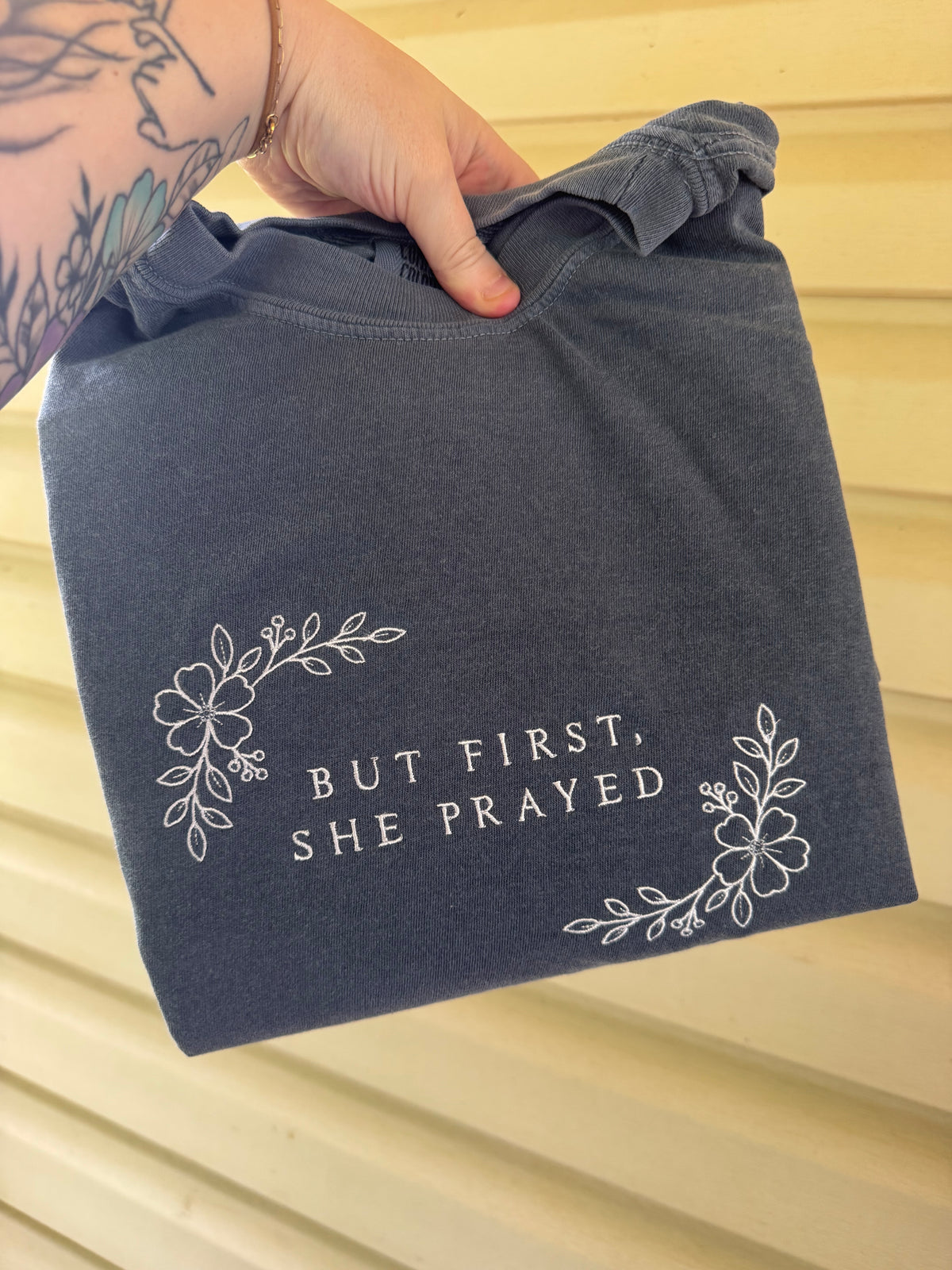 But first, she prayed embroidery